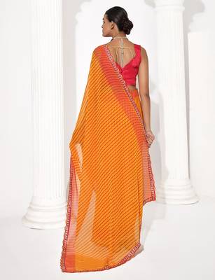 Orange georgette printed saree 2