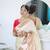 cream paithani silk blend zari motifs saree with contrast blouse