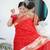 red paithani silk blend zari motifs saree with contrast blouse