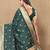 dark green paithani silk blend zari motifs saree with contrast blouse