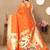 orange paithani silk blend zari motifs saree with contrast blouse