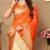 orange paithani silk blend zari motifs saree with contrast blouse