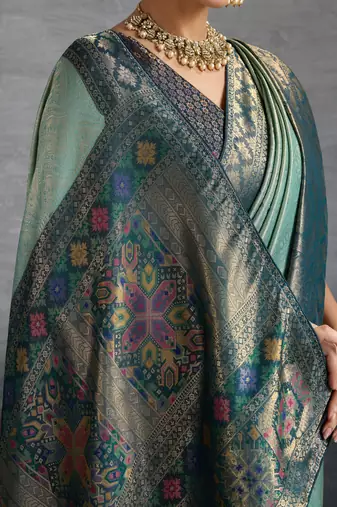 sea green kanjivaram double zari woven saree with meenakari pallu and blouse