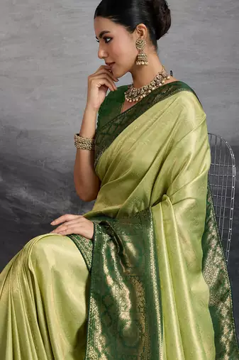 pista green kanjivaram double zari woven saree with meenakari pallu and blouse