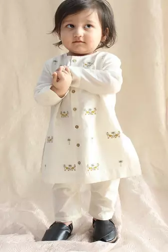 Cream embroidered chanderi  kurta pyjama