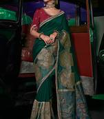 Green silk blend weaved pallu saree with embroidered blouse