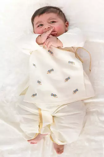 Cream embroidered cotton  kurta pyjama