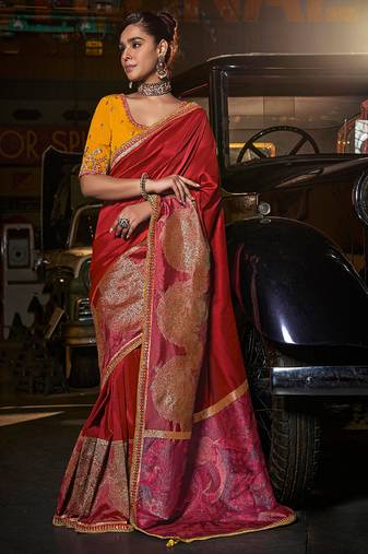 Red silk blend weaved pallu saree with embroidered blouse