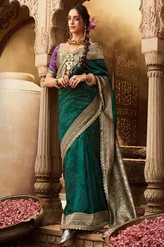 Green soft banarasi silk blend woven with lace border saree with blouse