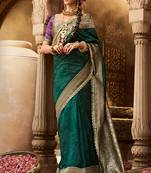 Green soft banarasi silk blend woven with lace border saree with blouse