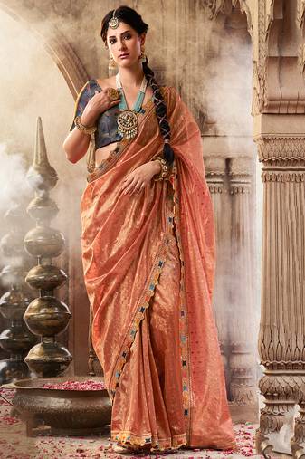 Peach  tissue woven with multicolored lace border saree with blouse