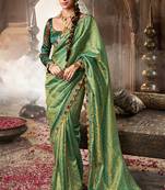 Sea green  tissue woven with multicolored lace border saree with blouse