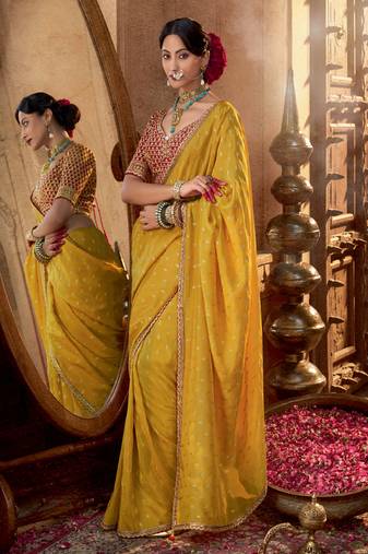 Mustard  viscose crepe hand dying and butti weaving with saree with embroidered blouse 