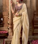 Cream  viscose crepe hand dying and butti weaving with saree with embroidered blouse 
