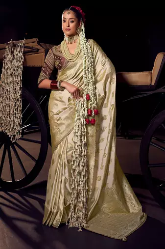 Cream  viscose tissue woven with hand work saree with embroidery blouse saree with blouse