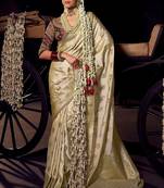 Cream  viscose tissue woven with hand work saree with embroidery blouse saree with blouse