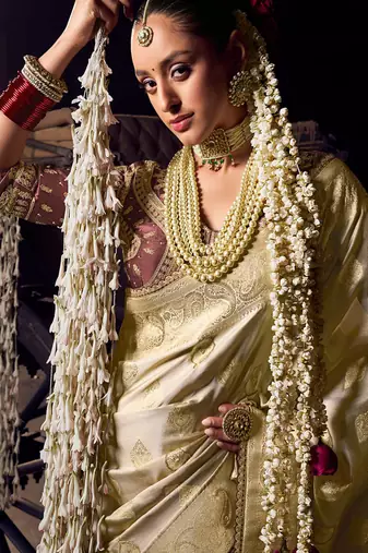 Cream viscose tissue woven with hand work saree with embroidery blouse saree with blouse