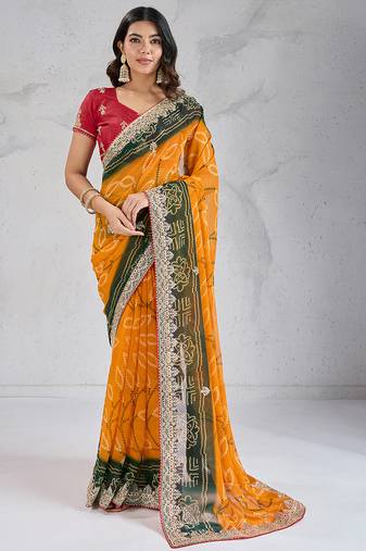 Engaging haldi yellow georgette embroidered indian designer saree