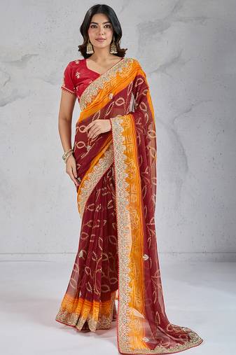 Alluring brown georgette embroidered india traditional saree