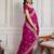 Enthralling rani pink georgette embroidered indian party wear saree