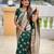 Green soft silk blend saree with zari weaving meenakari design