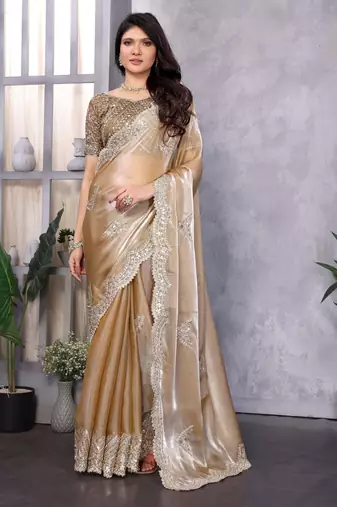 Cream shimmer chiffon embroidered saree with blouse piece