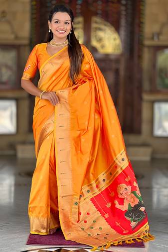 Orange silk blend saree with paithani rich weaved pallu and blouse