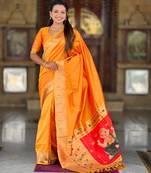 Orange silk blend saree with paithani rich weaved pallu and blouse