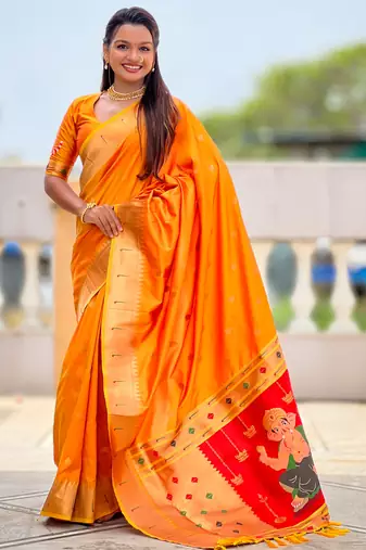 Orange silk blend saree with paithani rich weaved pallu and blouse