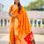 Orange silk blend saree with paithani rich weaved pallu and blouse