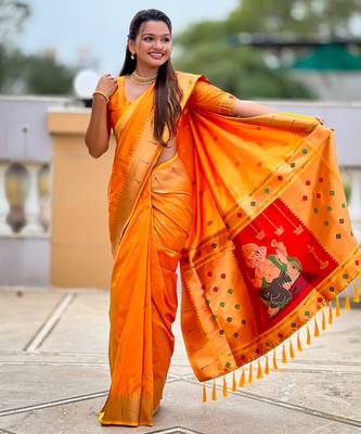 Orange silk blend saree with paithani rich weaved pallu and blouse 5