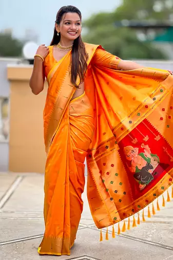 Orange silk blend saree with paithani rich weaved pallu and blouse