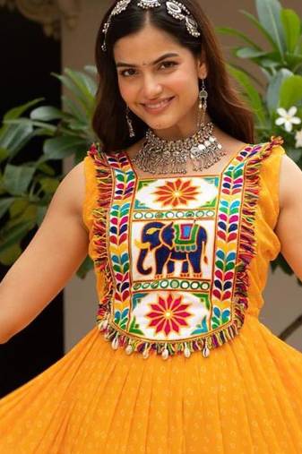 Yellow faux georgette badhni print with kutchi patche work navratri gown