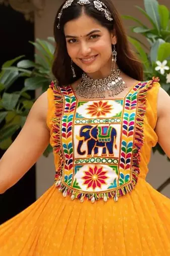 Yellow faux georgette badhni print with kutchi patche work navratri gown