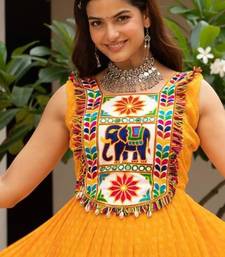 Yellow faux georgette badhni print with kutchi patche work navratri gown