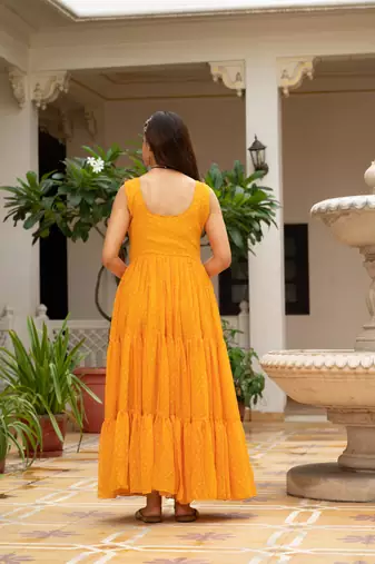 Yellow faux georgette badhni print with kutchi patche work navratri gown