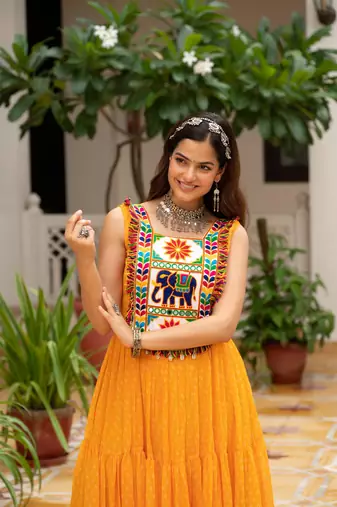 Yellow faux georgette badhni print with kutchi patche work navratri gown