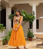 Yellow faux georgette badhni print with kutchi patche work navratri gown