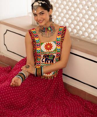 Pink faux georgette badhni print with kutchi patche work navratri gown 3