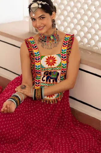 Pink faux georgette badhni print with kutchi patche work navratri gown