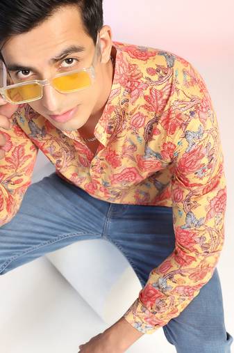 Orange cotton blend short kurta for men with printed design