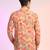 Orange cotton blend short kurta for men with printed design