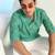 Green cotton blend short kurta for men with printed design
