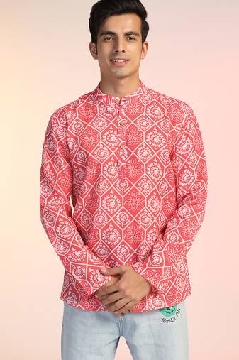 Orange cotton blend short kurta for men with printed design