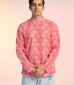 Orange cotton blend short kurta for men with printed design