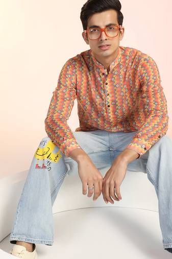Orange cotton blend short kurta for men with printed design
