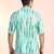 Green cotton blend short kurta for men with printed design