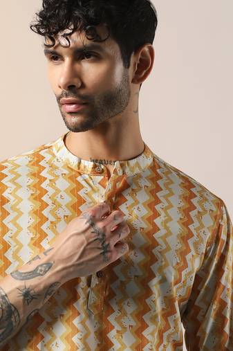 Yellow cotton blend short kurta for men with printed design