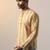 Yellow cotton blend short kurta for men with printed design