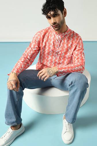 Orange cotton blend short kurta for men with printed design